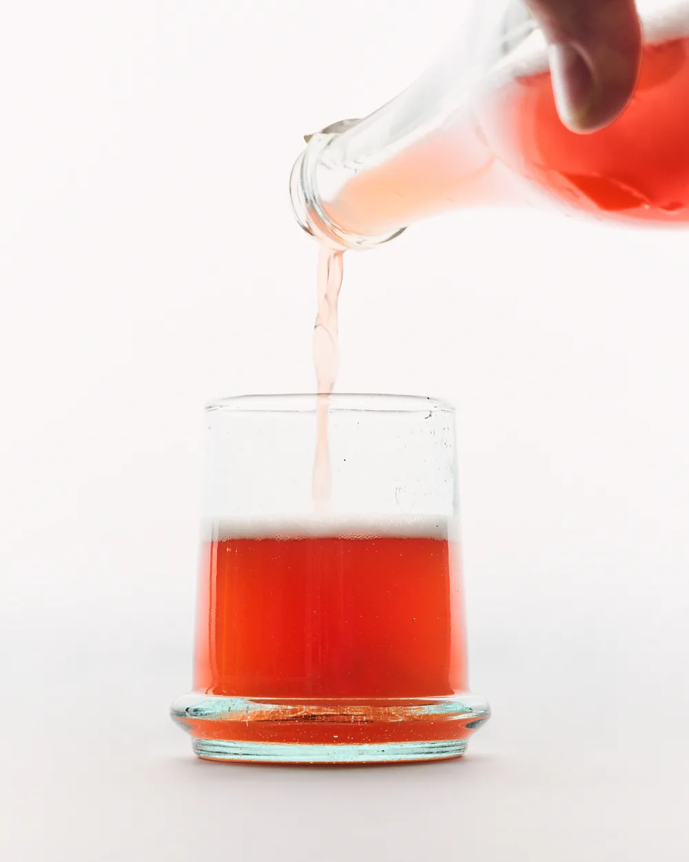 Dulse pouring into a small glass