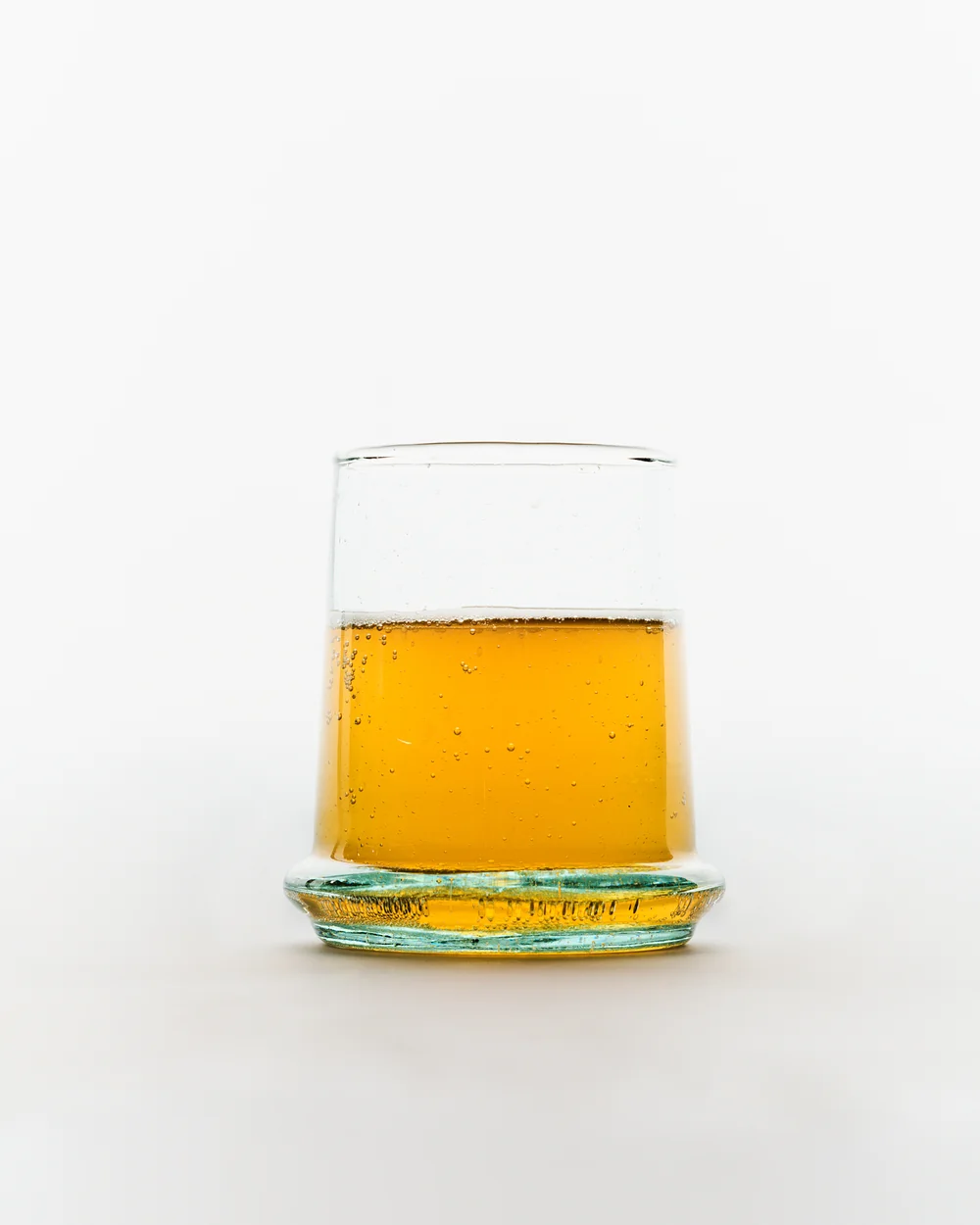A small glass of sugar kelp kombucha